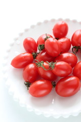 Freshness mini tomato on dish with copy space 