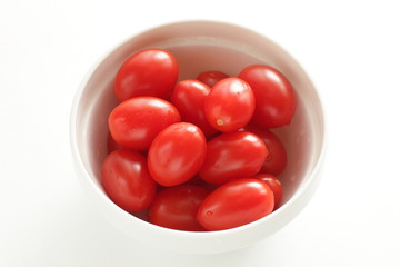 Freshness mini tomato on dish with copy space 