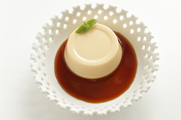 Caramel sauce and pudding with copy space