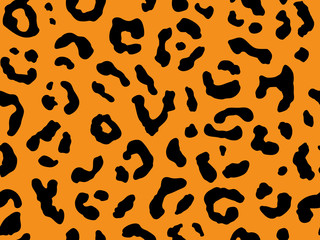 Fototapeta na wymiar Seamless leopard fur pattern. Fashionable wild leopard print background.