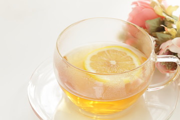 Freshness lemon tea in glass cup with brown sugar