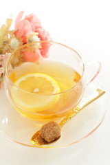 Freshness lemon tea in glass cup with brown sugar