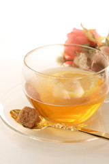 Freshness lemon tea in glass cup with brown sugar