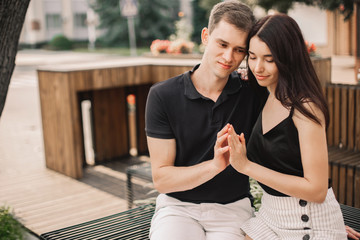 Naklejka premium Loving couple hugging in the street.
