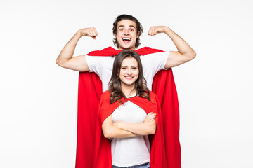 Young pretty couple in red hero look showing arm muscle isolated on white background