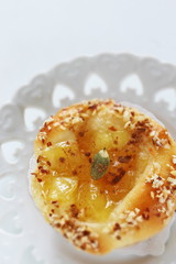 Homemade sweet apple Bun and tea