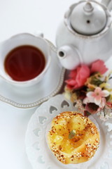 Homemade sweet apple Bun and tea