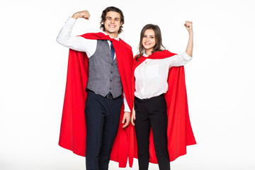 Young super couple in red cloaks standing with crossed arms and looking at camera isolated on white background