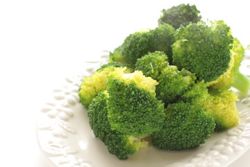 Boiled broccoli on dish vegetarian salad 