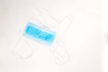 blue medical surgical disposable mask isolate on a white back ground 