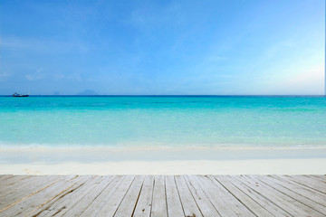 Top of wood table with sea and sky background- Empty ready for your product display montage. Concept of beach in summer