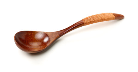 Wooden spoon isolated on white background