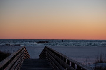 Fototapeta na wymiar beach boardwalk sunset glow