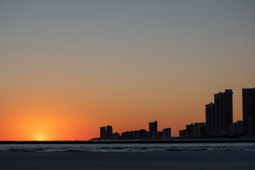 Naklejka premium orange beach gulf shores sunset