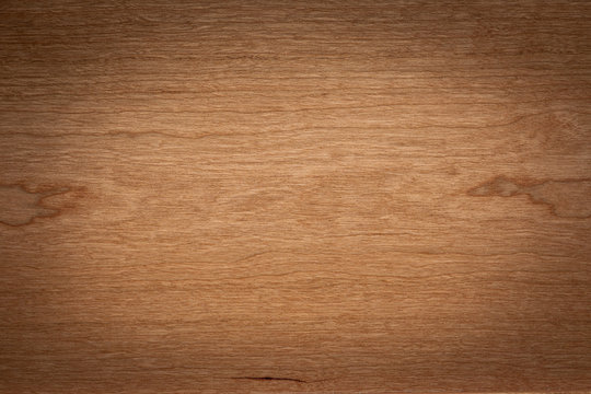 Walnut color wooden board texture background. Dark tone cherry wood plank background. Texture element.
