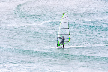 windsurfing on the background of the sea
