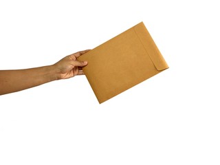 Isolated a hand giving or holding a brown envelope on white background.