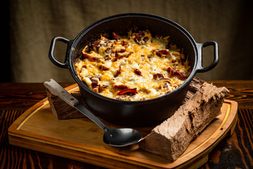 BBQ Side of Melted Mac and Cheese in a Cast Iron Bowl and Plated
