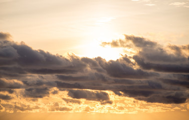 sunset sky with clouds in the mountains background