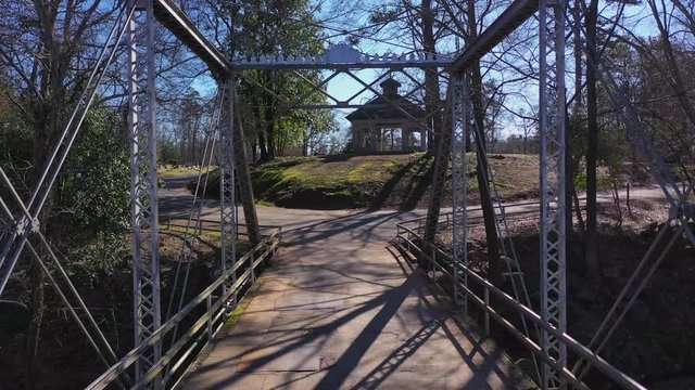 Reverse aerial view of bridge at old cemetery