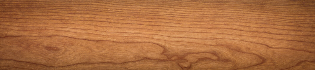 Obraz premium Deska drewniana tekstura kolor orzecha włoskiego. Bardzo długie drewniane deski tekstura tło. Tło deski z drewna wiśniowego. Element tekstury.