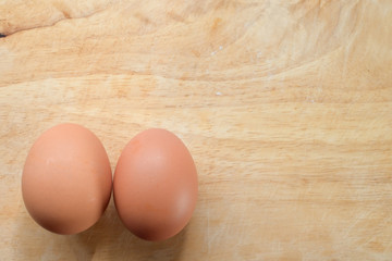 hen egg put on wood cutting board in kitchen prepare cooking