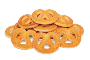 Sweet pretzel biscuit with sugar. A heap of cookies