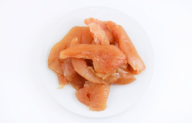 Chicken carpaccio fillet on a white plate isolated on a white background. Delicacies. Italian food. Copy space