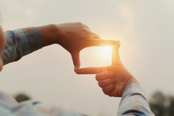 close up woman make hand framing gesture distant view. business concept
