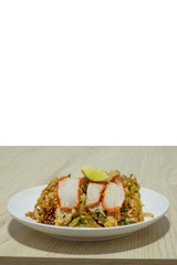 Pad Thai on a plate, put on the table.