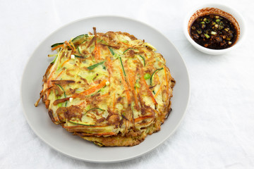 Cuttlefish, zucchini, spring onion and carrot pancake