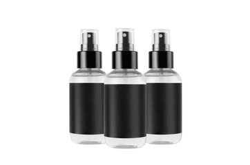 Transparent spray bottles for cosmetics product with black blank label isolated on white background, mock up for branding, advertising,  design.