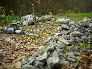 Crushing concrete with pneumatic hammer