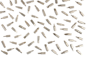 Flat lay screwdriver bit set close-up, white background.
