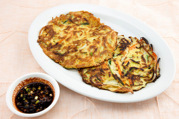 Cuttlefish, zucchini, spring onion and carrot pancake