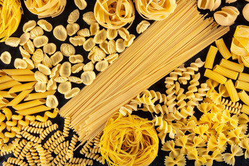 Italian pasta sorts variety, a flatlay of various pasta types, shot from the top