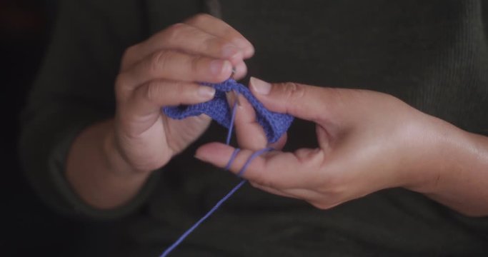 Taiwanese ethnic minority Amis woman knitting - close up