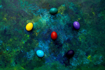 Obraz na płótnie Canvas Color easter eggs on colorful background.