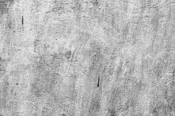 Texture of a concrete wall with cracks and scratches which can be used as a background