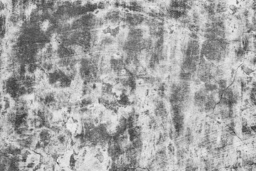 Texture of a concrete wall with cracks and scratches which can be used as a background