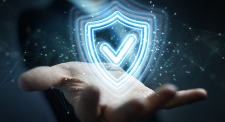 Fototapeta premium Man hand using digital shield protection blue holographic interface 3D rendering