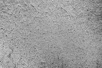 Texture of a metal wall with cracks and scratches which can be used as a background