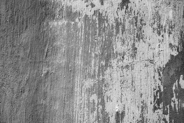 Texture of a concrete wall with cracks and scratches which can be used as a background