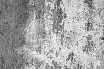 Texture of a concrete wall with cracks and scratches which can be used as a background
