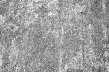 Texture of a concrete wall with cracks and scratches which can be used as a background