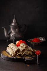  pancakes with red caviar
