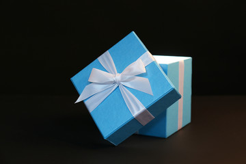 Beautiful gift box on dark background