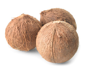 Ripe coconuts on white background