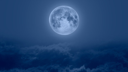 Obraz na płótnie Canvas Night sky with moon in the clouds 