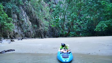 Colourful Kayak in the Morakot Cave, Emerald Cave, in Koh Mook
